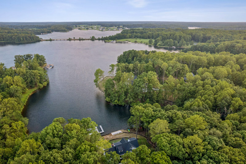 Aerial view of a wooded Lake Anna cove and its shoreline lots.